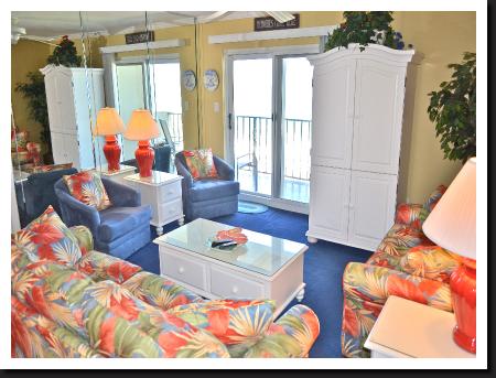 Living room sliding door  to balcony with view of beach